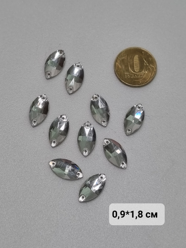 Стразы пришивные. Эллипс с заостренными концами. Стекло. Прозрачные 1,8*0,9 см. Стразы пришивные. Эллипс с заостренными концами. Стекло. Прозрачные 1,8*0,9 см.