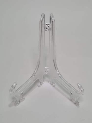 Подставка треугольная. Прозрачный пластик. Размер: высота 14,5 си, размах лапы 9 см. Упаковка 5 шт. фото 2