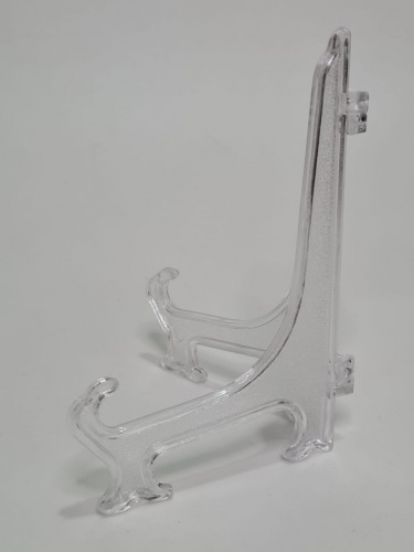 Подставка треугольная. Прозрачный пластик. Размер: высота 14,5 си, размах лапы 9 см. Упаковка 5 шт. фото 3